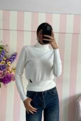 STORIA MAGLIA CORINNE